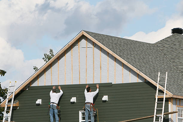 Professional Siding Installation technician working in Roslindale, MA